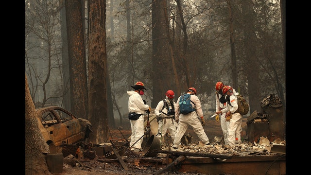 Searchers in Camp Fire step up efforts ahead of rain; 1,000 remain unaccounted for