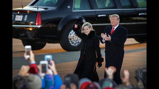 GOP US Sen. Hyde-Smith wins divisive runoff, keeps her seat