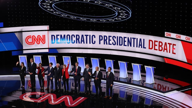 Democratic candidates spar over health care in first half of 2nd presidential primary debate