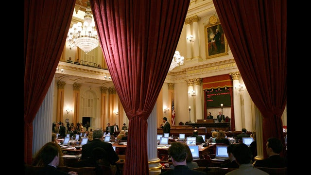 Emotion-charged hearing advances bill on police shootings