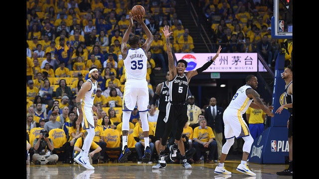 Durant, defending champ Warriors get defensive, beat Spurs
