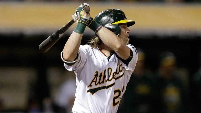 World Series champ Giants lose to A's, out of wild-card race