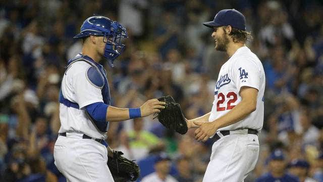 Kershaw's 15 Ks lead Dodgers over Giants 2-1