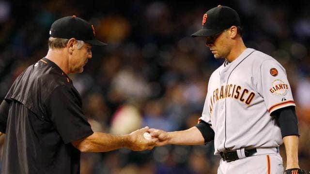 Gonzalez hits 2 HRs as Rockies rout Giants 11-3