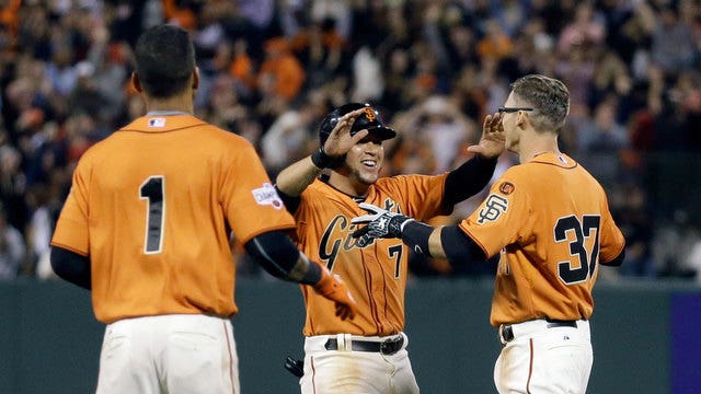 Tomlinson lines game-winning single as Giants beat Cardinals