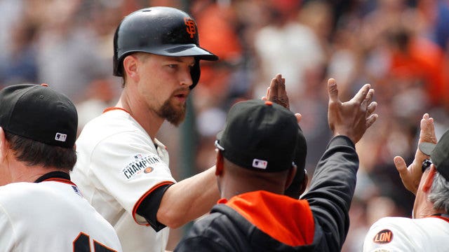 Leake pitches, hits Giants to 10-3 victory over Padres