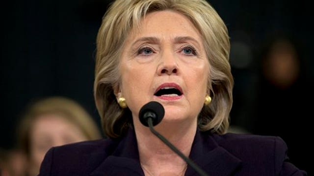 Under GOP grilling, Clinton seeks to close book on Benghazi