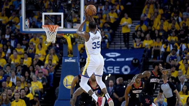 Durant's 35 points carry Warriors past Rockets in Game 1