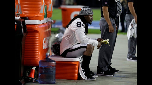 Raiders' Marshawn Lynch takes a seat for National Anthem in pre-season opener