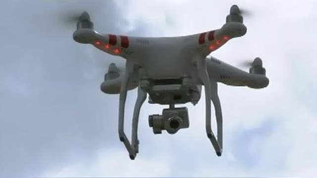 2 charged with using drone to fly drugs into California jail
