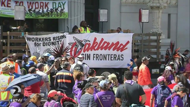 Hundreds rally for immigrant rights, local union hires on May Day in Oakland