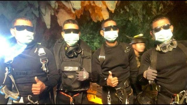 Medic, divers who stayed with boys leave cave