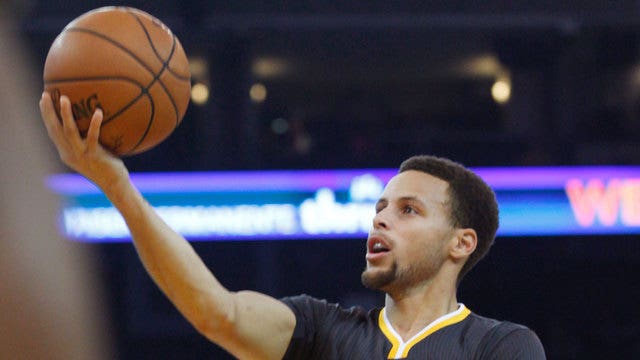 Curry leads Warriors past Nets 107-99 in overtime