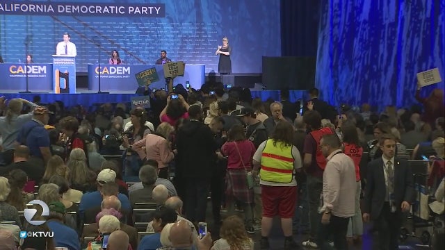 With Biden absent, his rivals pounce at San Francisco Democratic gathering