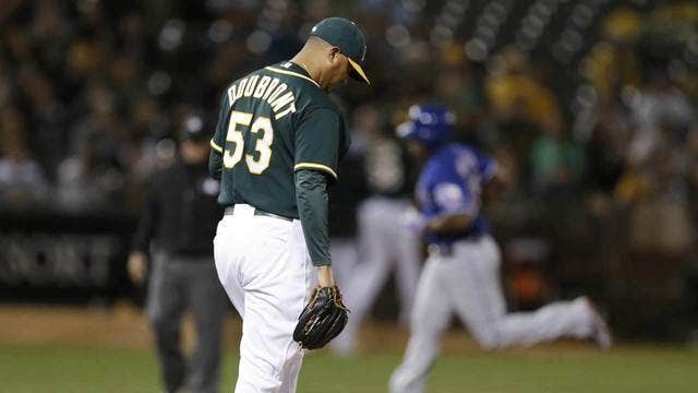 Andrus, Beltre power Rangers past Athletics
