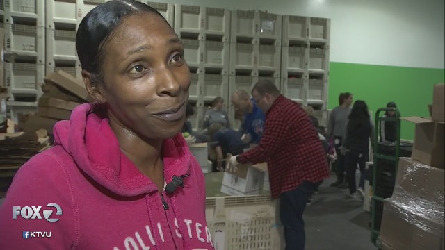 SF-Marin Food Bank packing food for Camp Fire victims