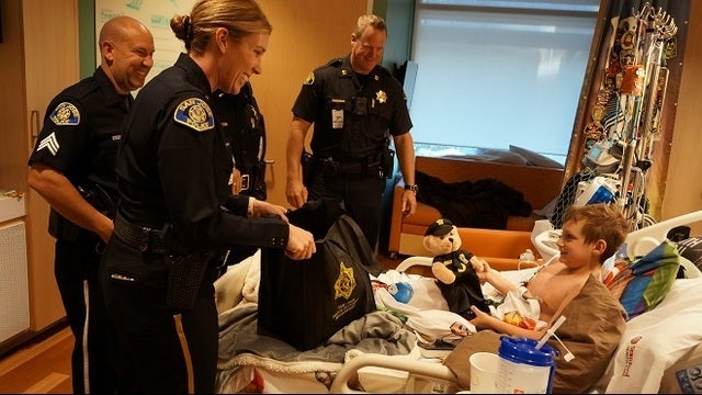 San Jose officers deliver care package to boy awaiting heart transplant