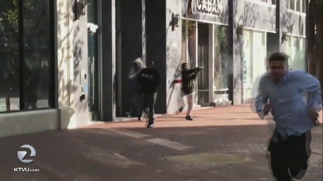 Wild video shows man firing gun on crowded, busy San Francisco Market Street