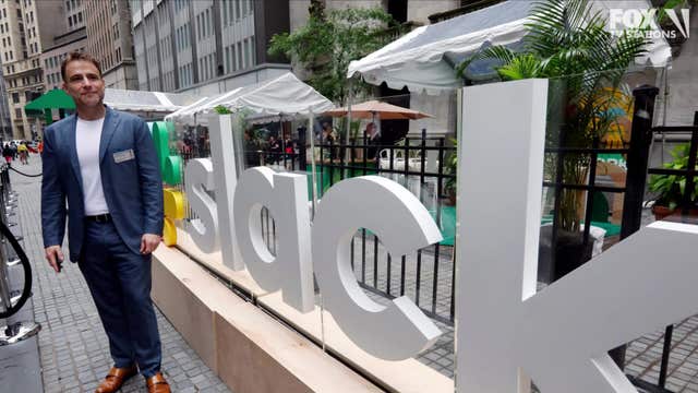 Slack shows up for work and rallies in Wall Street debut