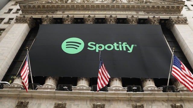 Spotify hits 100 million paid user mark