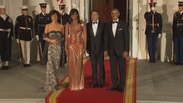 Michelle Obama shines in Versace at White House dinner