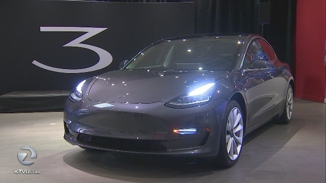 Tesla cuts 9 percent of workforce in bid to post a profit