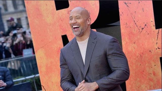 Viral photo: Dwayne 'The Rock' Johnson feed girlfriend while she nurses