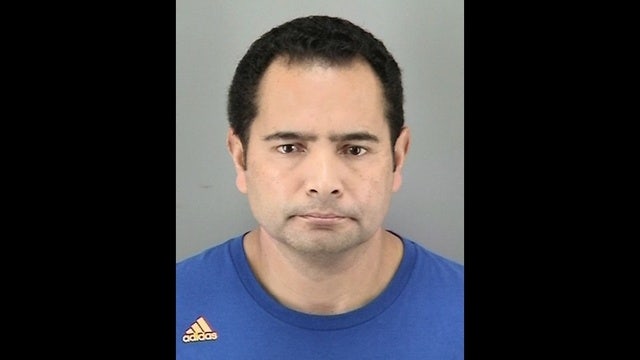 Teacher allegedly dangled student from balcony, surrenders to police