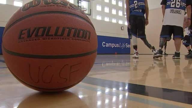 Warriors and UCSF amputees hold basketball camp