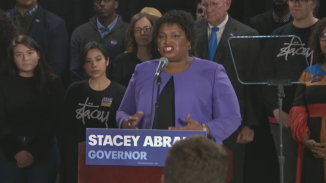 Abrams ends Georgia governor bid, says she'll file lawsuit