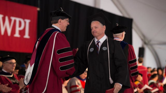 College custodian takes free classes, graduates