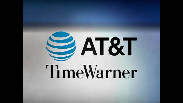 Justice Dept. sues to stop AT&T's $85B Time Warner deal