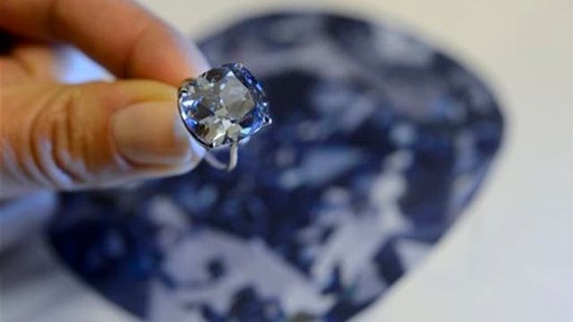 Rare blue diamond sells for record $48.5 million at auction