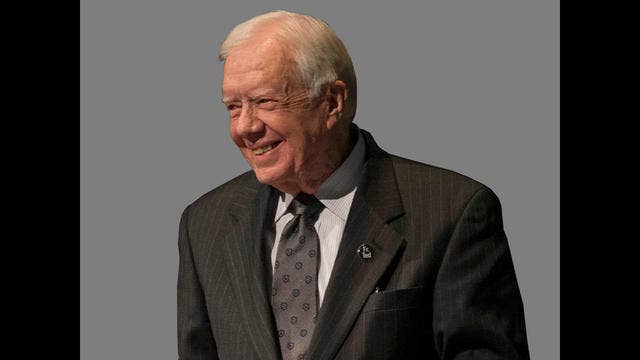 Jimmy Carter defends President Trump on immigration decision