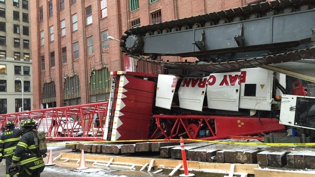 Manhattan crane topples into street killing 1, injuring 3