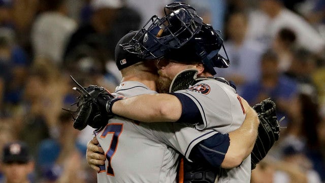 Springer's HR in 11th gives Astros 7-6 win, ties Series 1-1