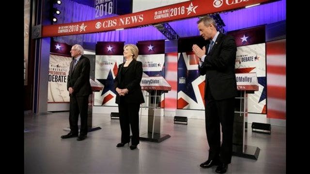 Democratic Debate: Clinton goes after Sanders on taxes, health care