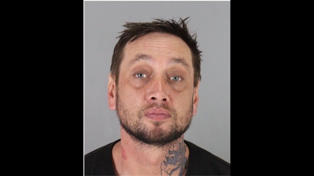 Man arrested after deputies find him asleep in hot car with infant