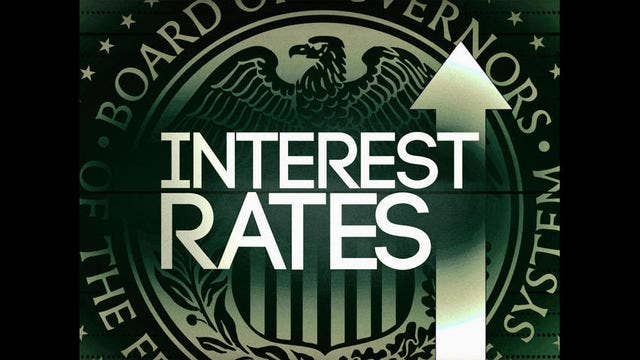 Fed approves short-term rate hike