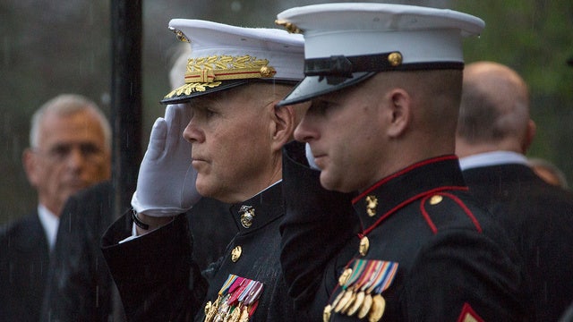 Marines go to great lengths to get high and tight haircuts