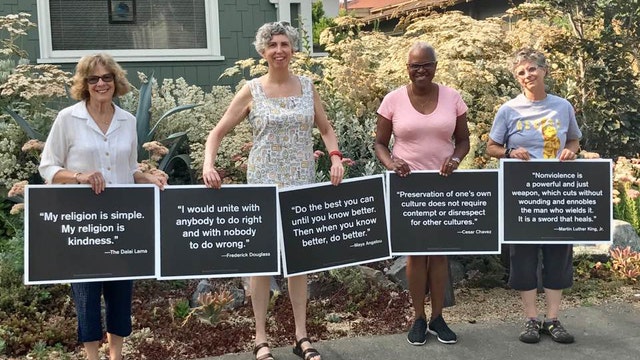 Four Santa Rosa neighbors set out to change the world, one yard sign at a time