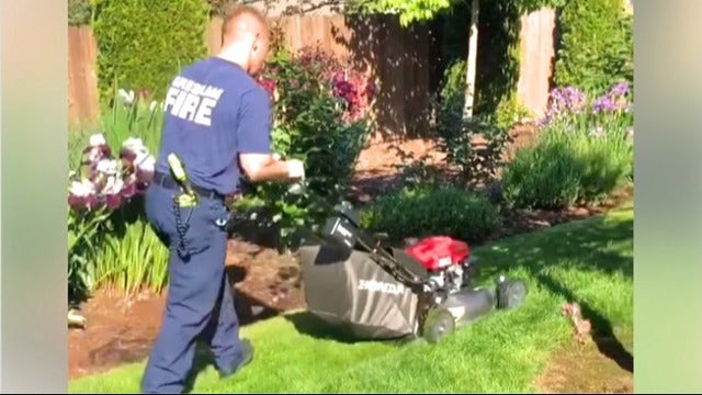 Firefighters finish mowing lawn for elderly patient who collapsed in yard