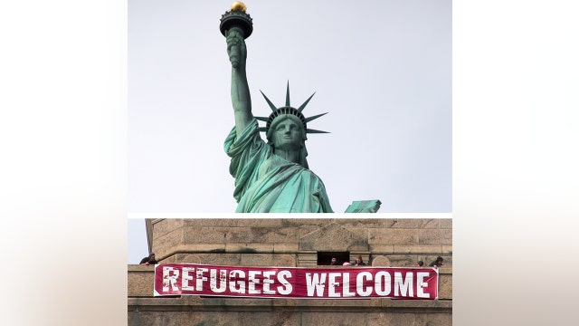 Banner hung at Statue of Liberty