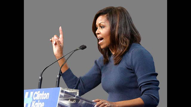 Michelle Obama offers empowering example for girls