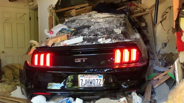 Mustang crashes into Lafayette home, driver taken to hospital