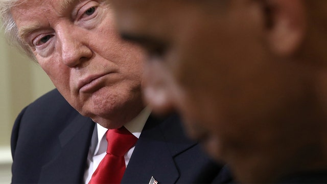Trump blames Obama administration for US response to Russian hacking