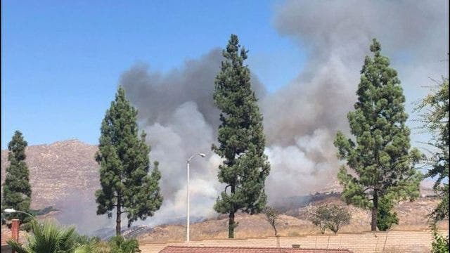 Crews battling vegetation fire in Riverside