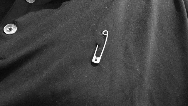 Critics jab 'safety pin' campaign amid Trump presidency fear