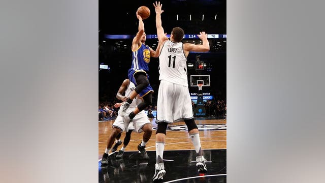 Warriors move to 22-0 by pulling away from Nets, 114-98