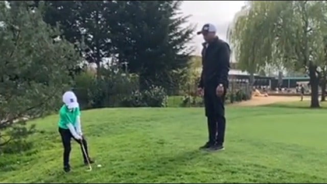 That Kid's Got Game: 6-year-old golfer hits flop shot over dad's head and makes it